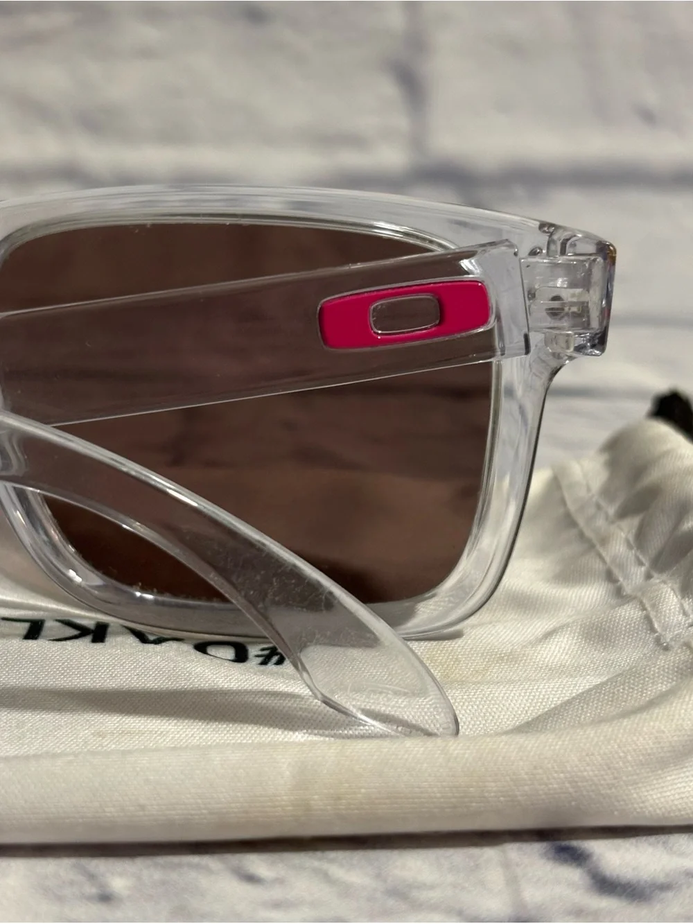 Oakley “Holbrook” customized clear frame/pink detail sunglasses + sleeve